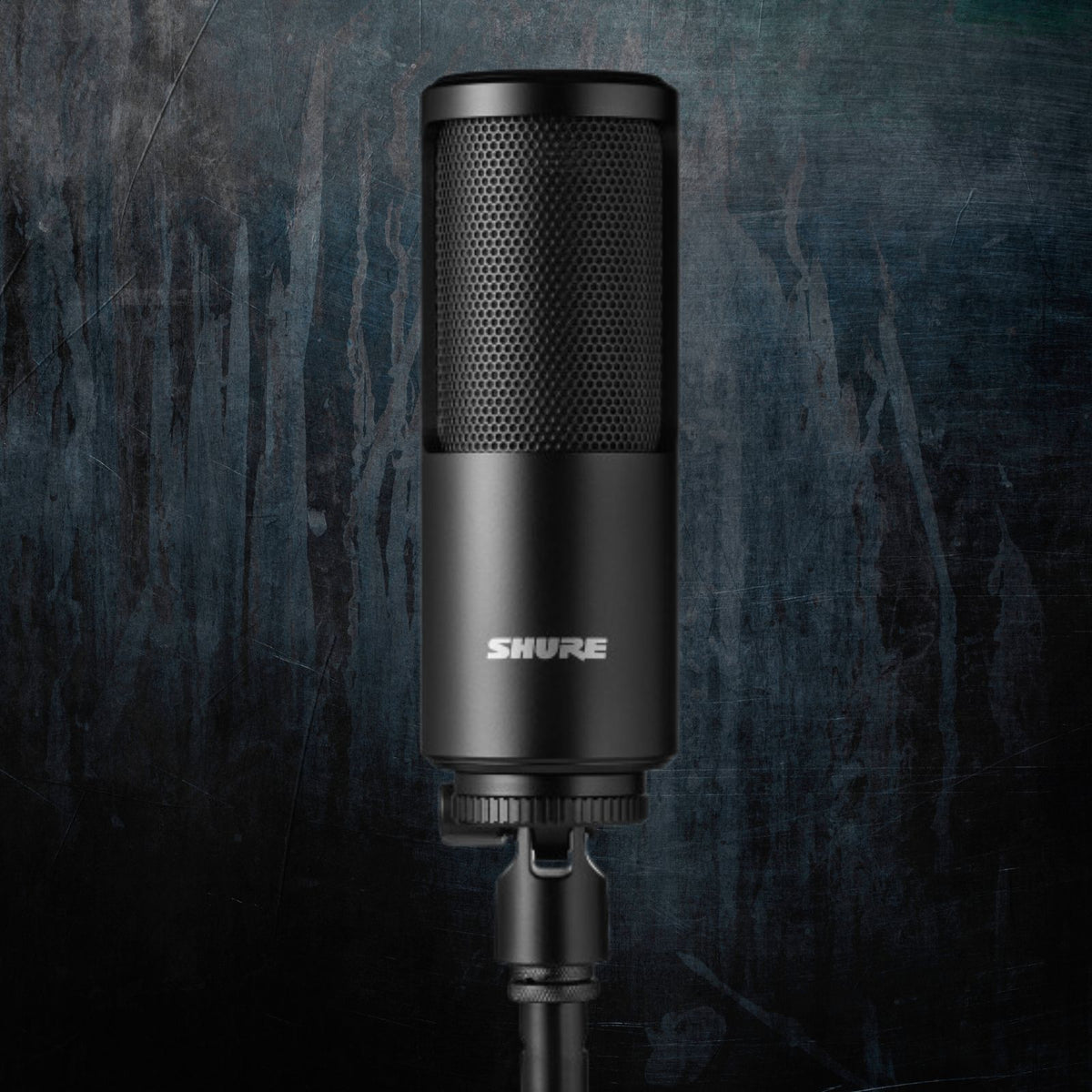 A Shure microphone set against a dark background